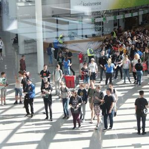 People milling about in a convention concourse